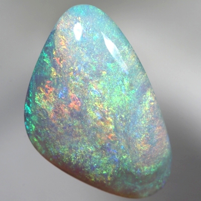 SOLID SEMI BLACK OPAL Sheen pattern, orange, green over blue. SEE VIDEO